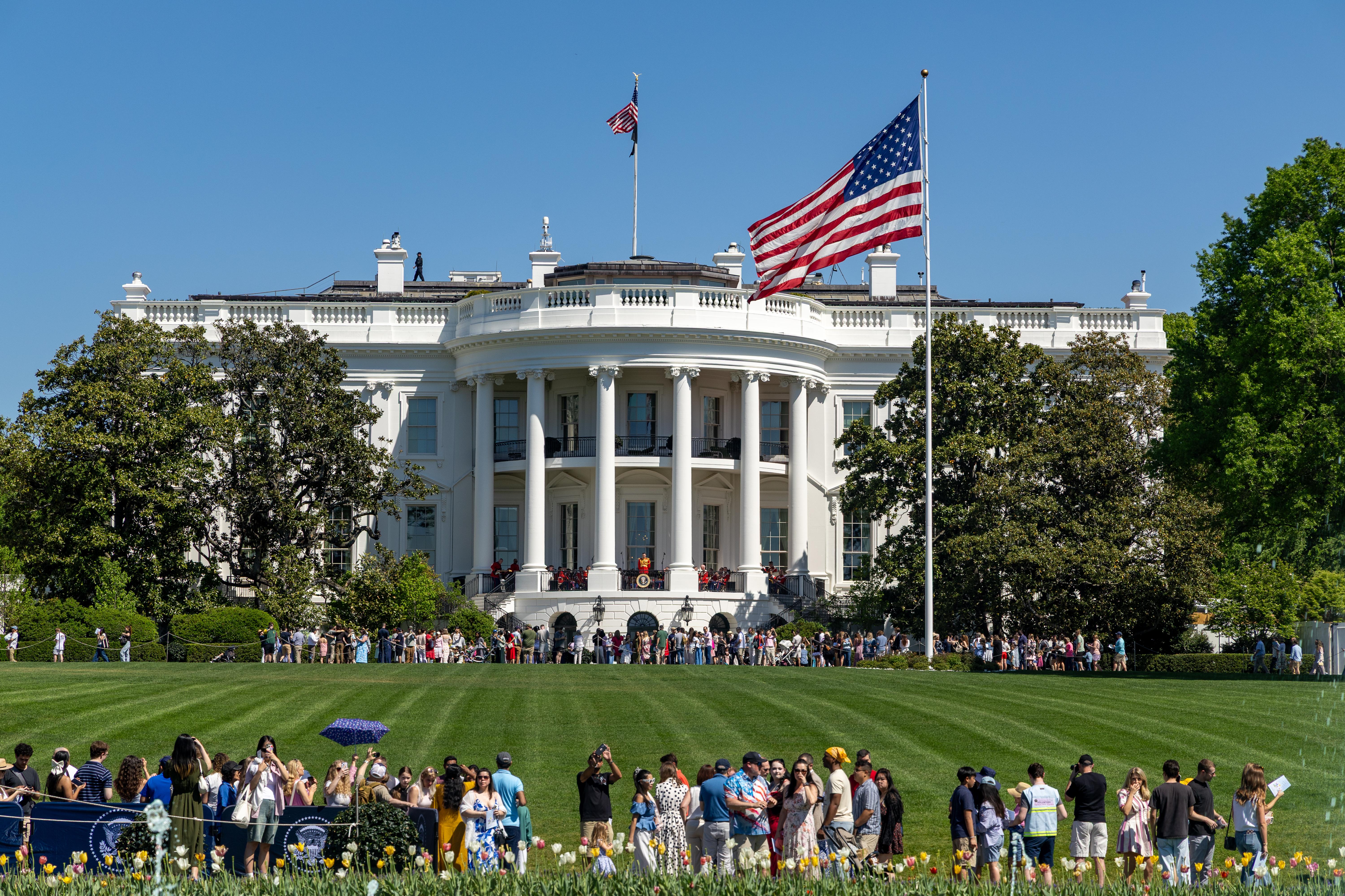 A National Park Service presence in President's Park near the White House, such as an NPS ranger or marked vehicle in a public area