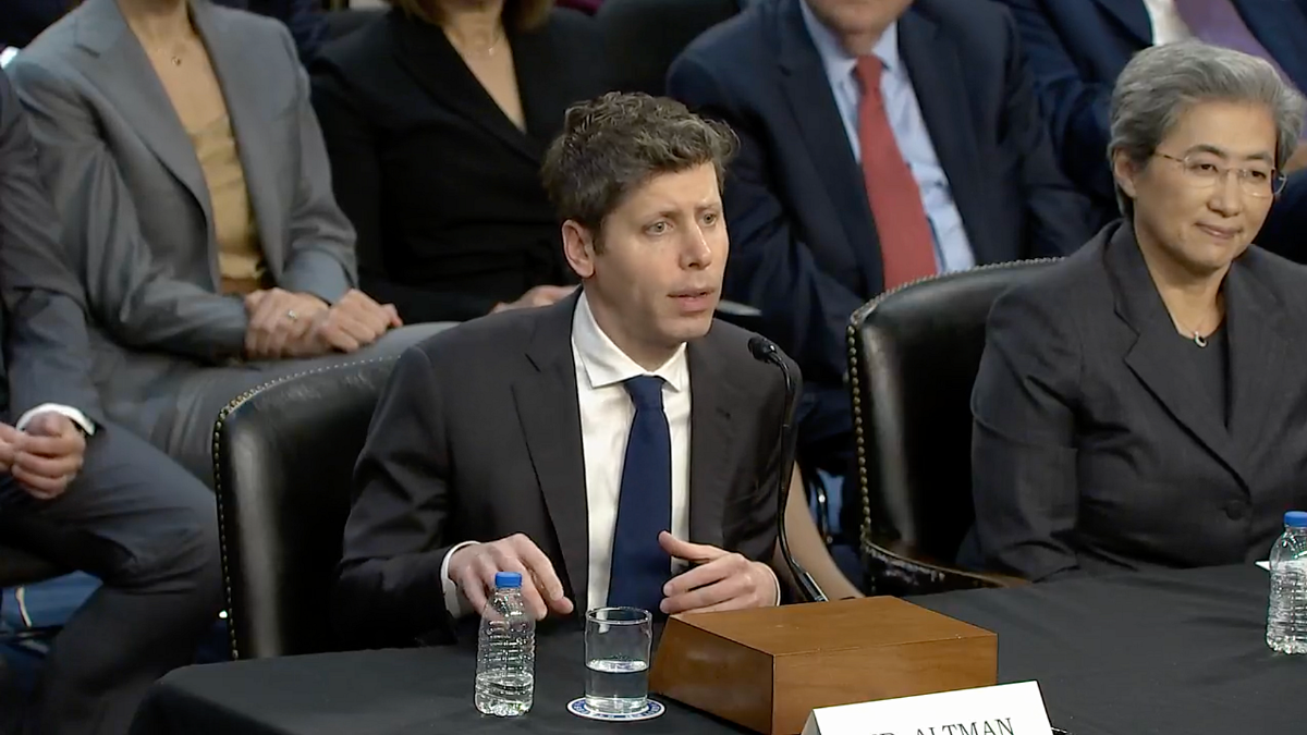 A U.S. Capitol hearing room in Washington, DC during a modern technology privacy discussion, with microphones and nameplates on a dais and attendees seated, news photography style