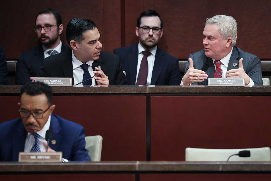 A U.S. House committee hearing room set up for an oversight hearing, with microphones and nameplates at the dais
