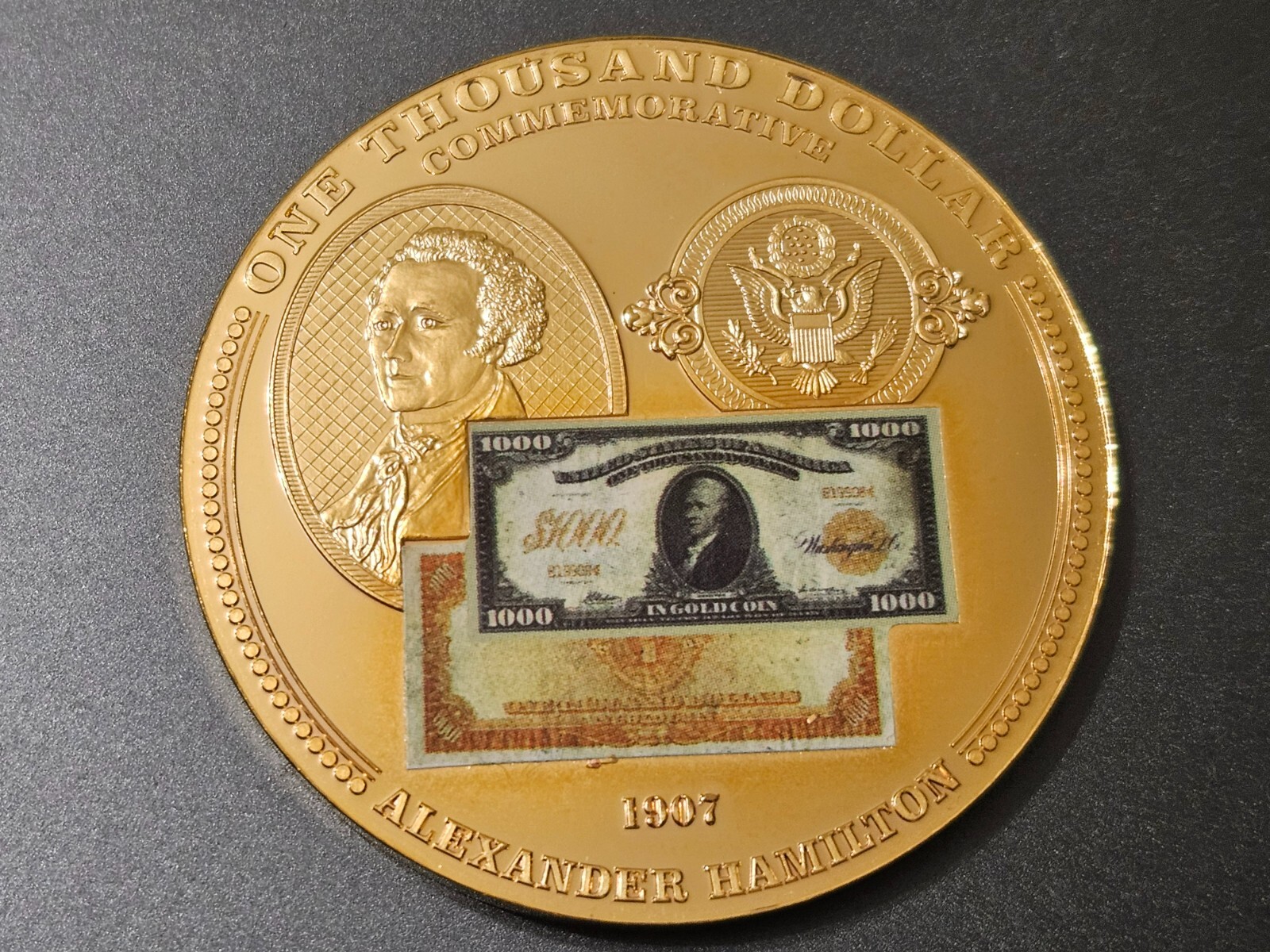 A close-up photograph of a single gold coin resting on a dark velvet surface under spotlight lighting, with the coin sharply in focus and the background softly blurred, realistic news photography