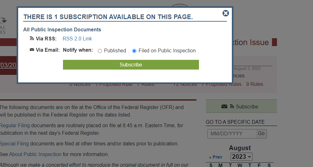 A close-up photograph of printed Federal Register pages spread on a desk with a pen and notebook beside them, office lighting, documentary style