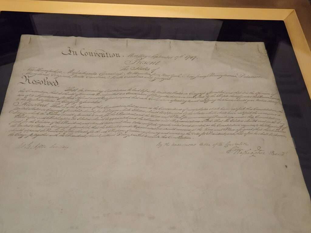 A close view of a historical page of the Fourteenth Amendment on display in Washington, documentary photo