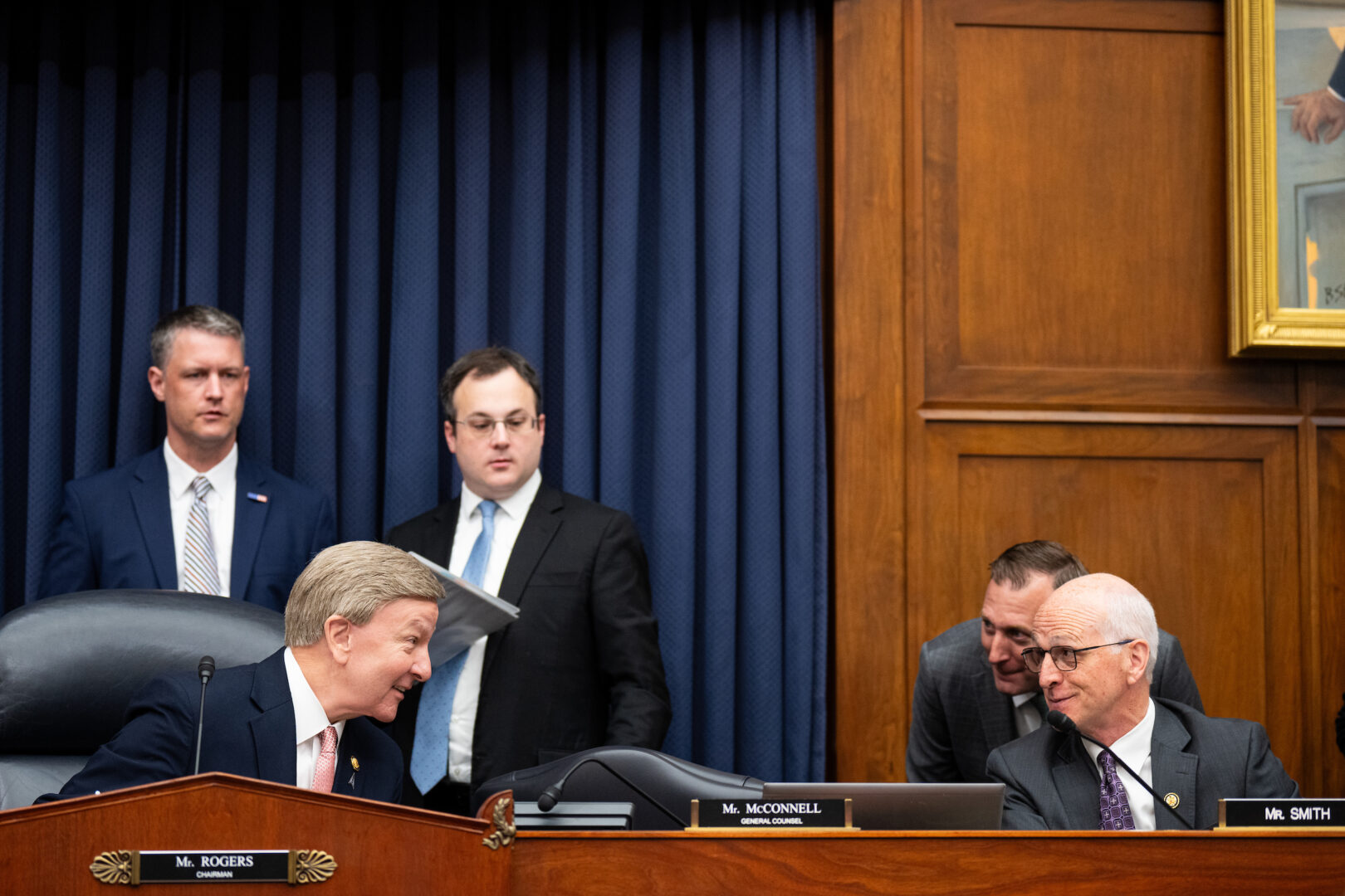 A congressional hearing room in Washington, DC during a House Appropriations Committee meeting, with lawmakers seated at a dais and staff at tables in front, news photography style