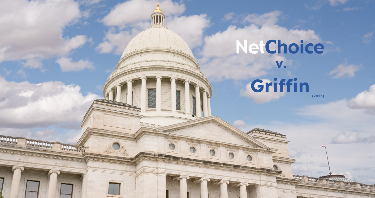 A federal courthouse in Arkansas on a clear day with people walking near the entrance, news photography style
