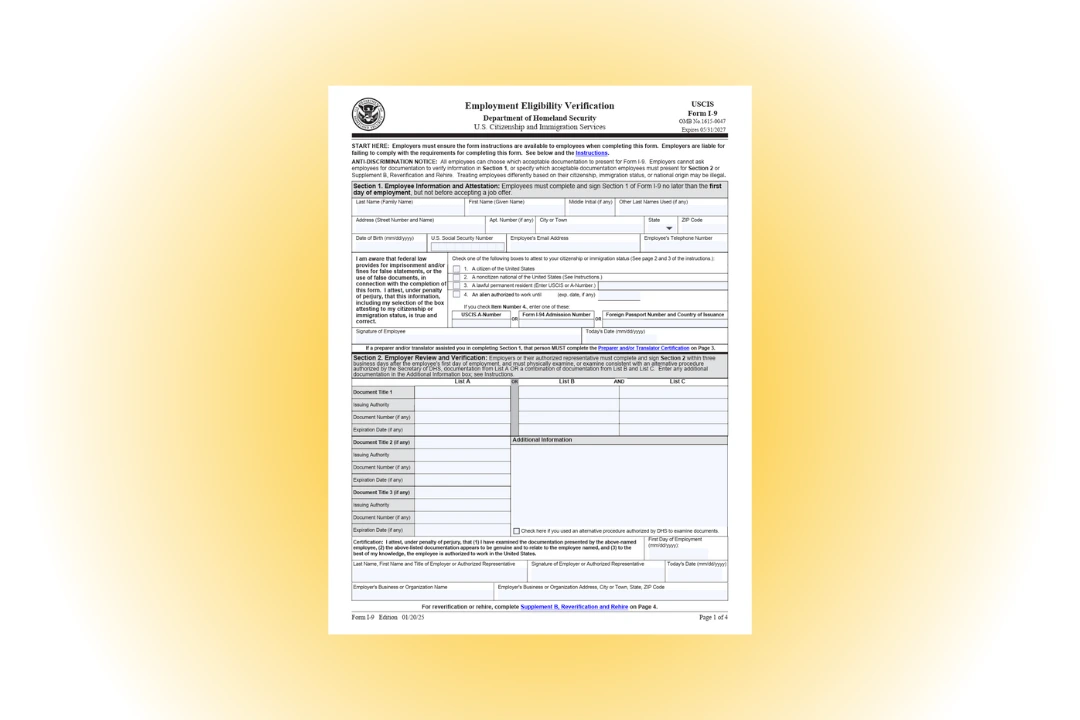 A government-issued USCIS Form I-9 Employment Eligibility Verification document shown on a desk, with the form header visible