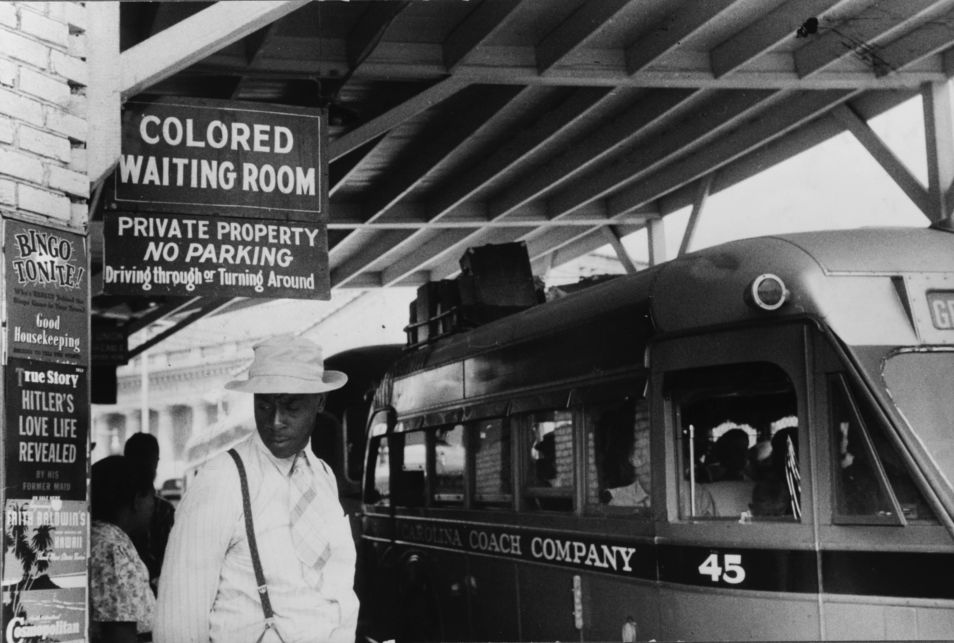 A historical-style photograph scene of Homer Plessy standing on a train platform in New Orleans in the late 19th century, with a passenger railcar behind him, news photography style