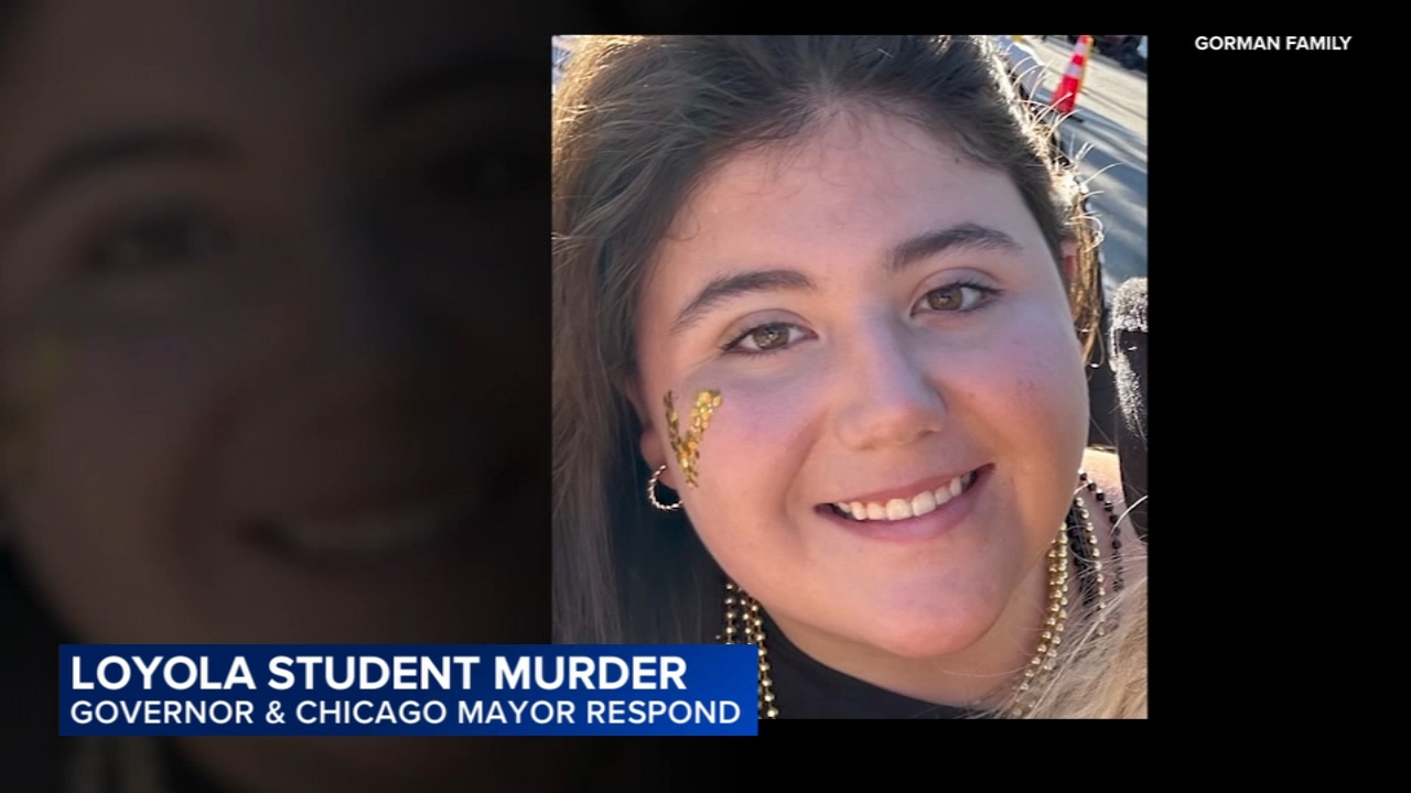 A man being escorted by law enforcement officers outside a courthouse, news photography style