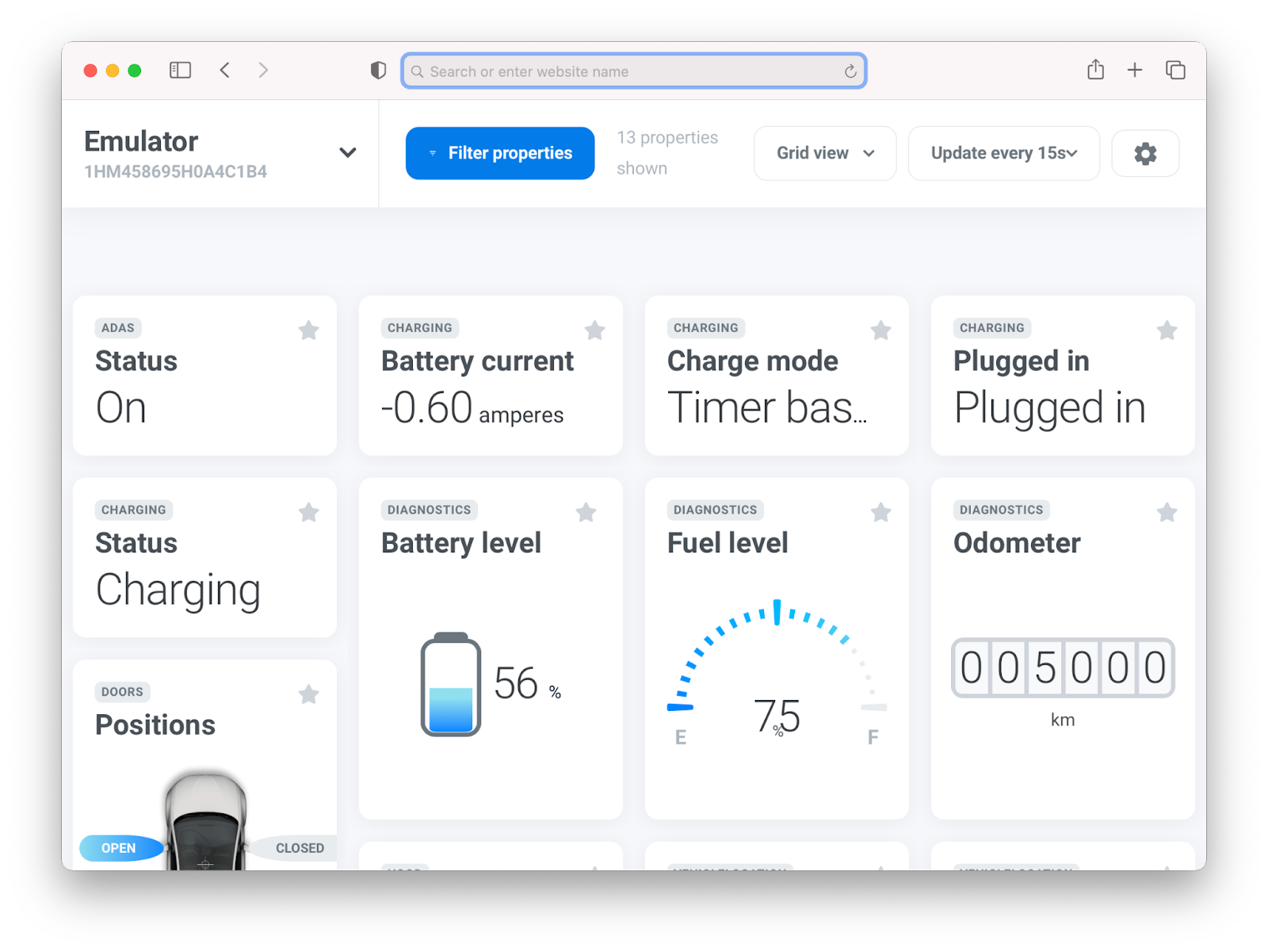 A modern car interior at night with a lit digital dashboard and navigation screen visible, photographed from the back seat in a realistic documentary style