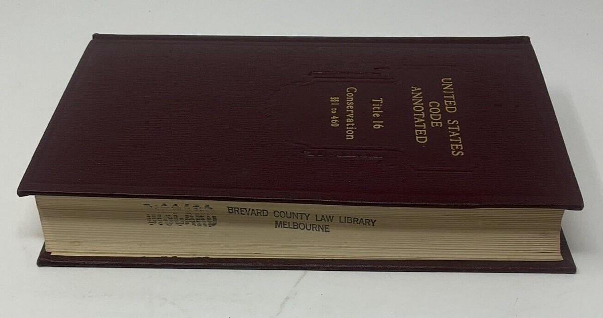 A photo of bound volumes of the United States Code in a law library, representing federal election statutes