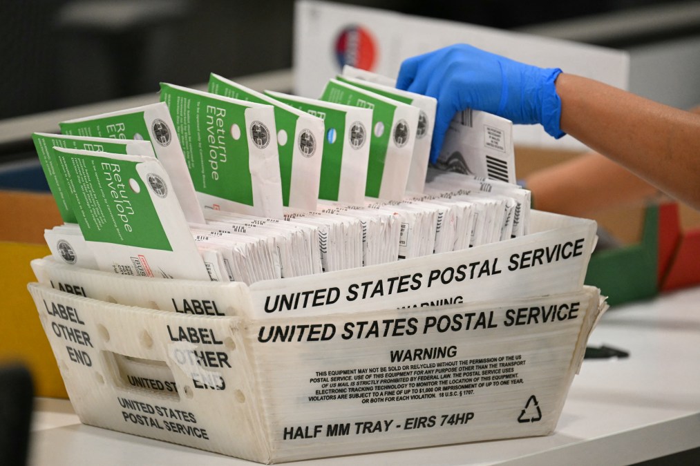 A photograph of U.S. Postal Service mail handling that can illustrate how mail ballots are delivered and returned as part of vote-by-mail systems