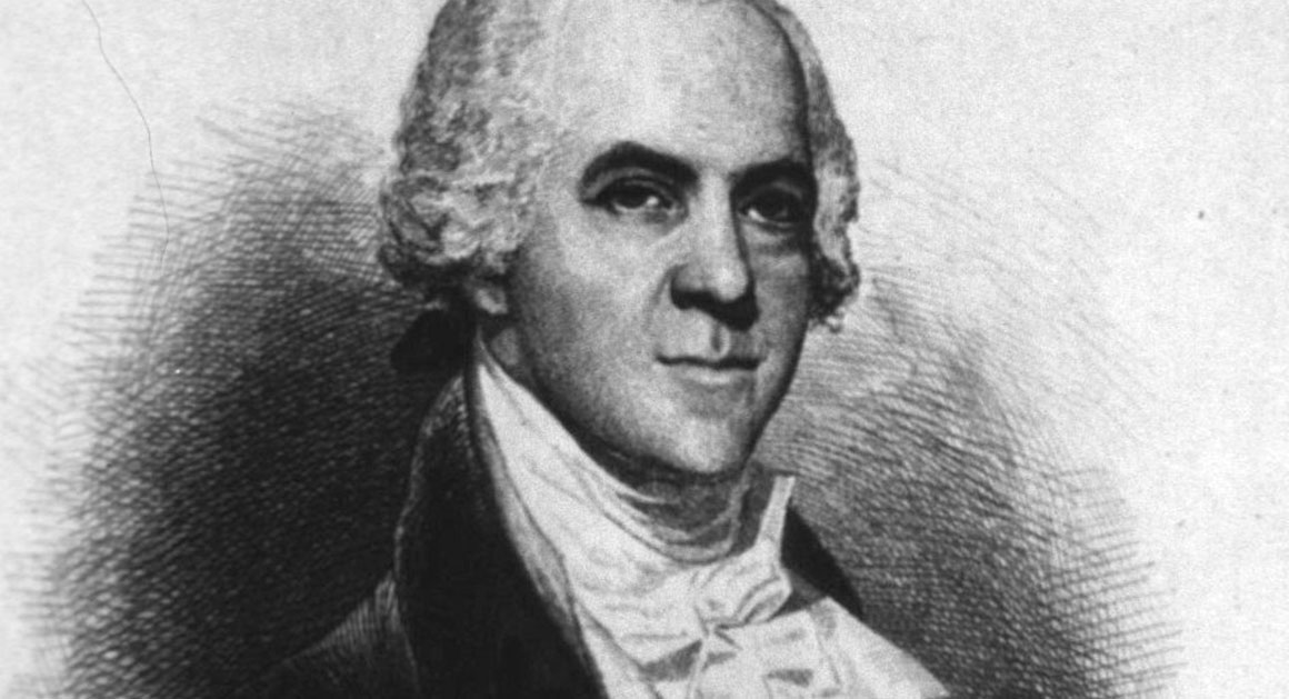 A photograph of an oil portrait of George Logan displayed in a museum setting, with soft gallery lighting and the framed painting filling most of the shot