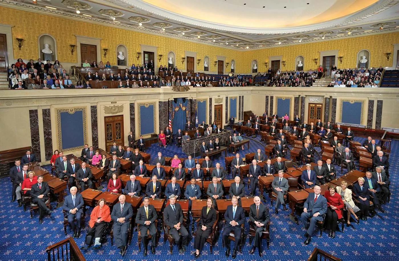 A photograph of the United States Senate standing rules in printed form, opened to a dense text page that includes Rule XXII on cloture