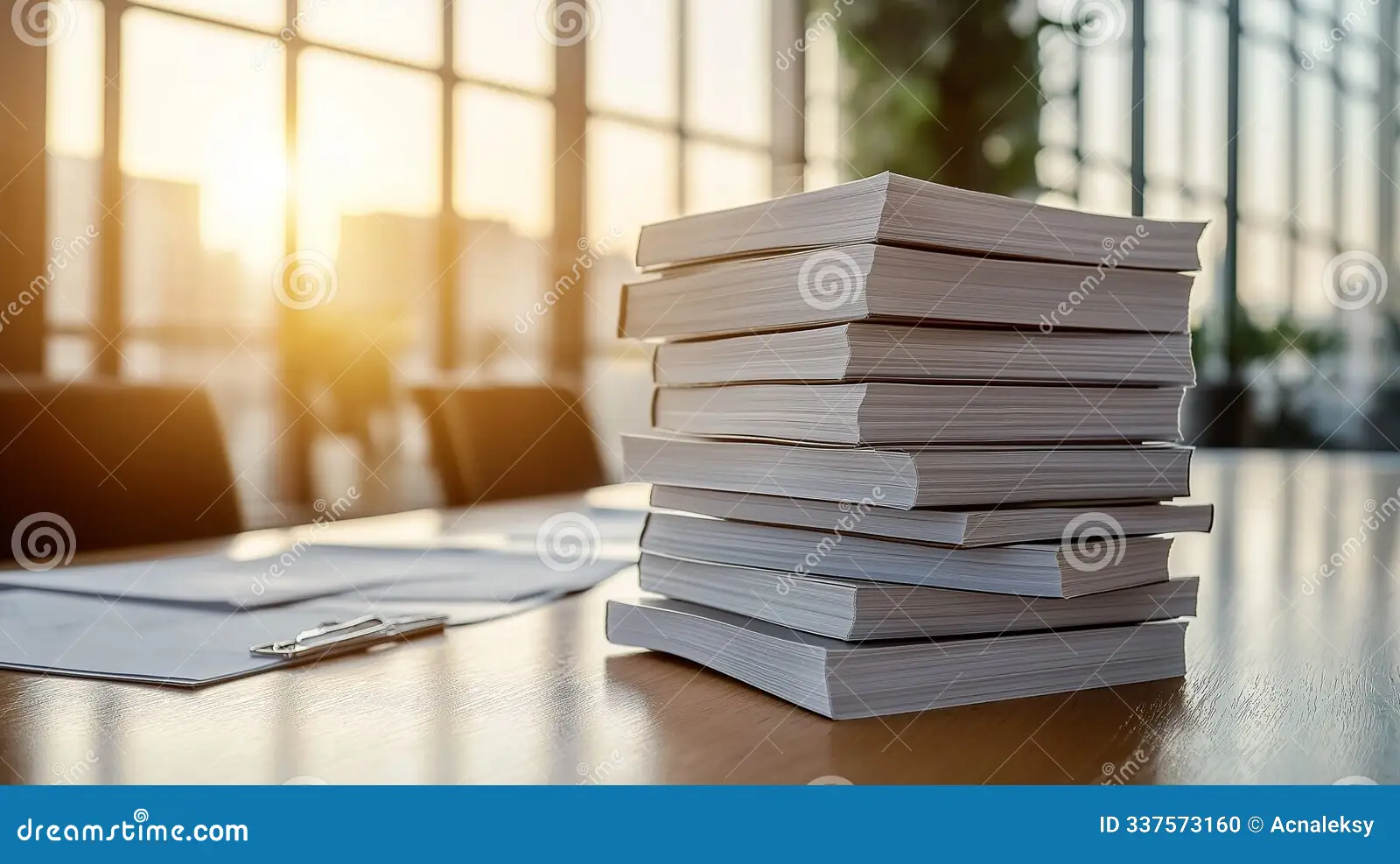 A real conference room table with stacks of legal documents and open laptops as attorneys prepare litigation materials, realistic photography style