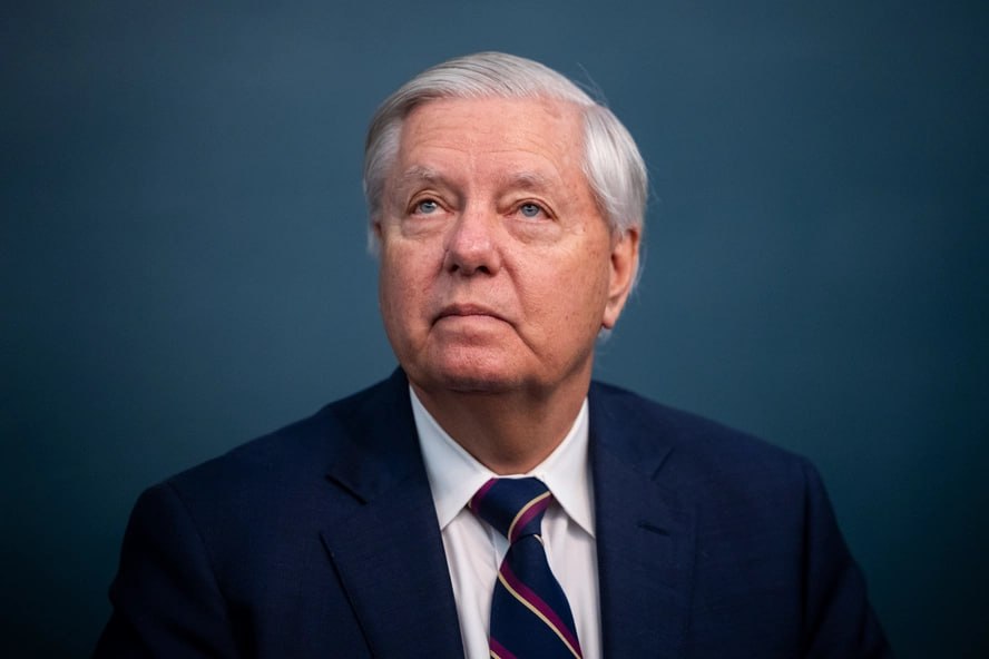 A real photograph of the late U.S. Sen. Lindsey Graham speaking at a public event