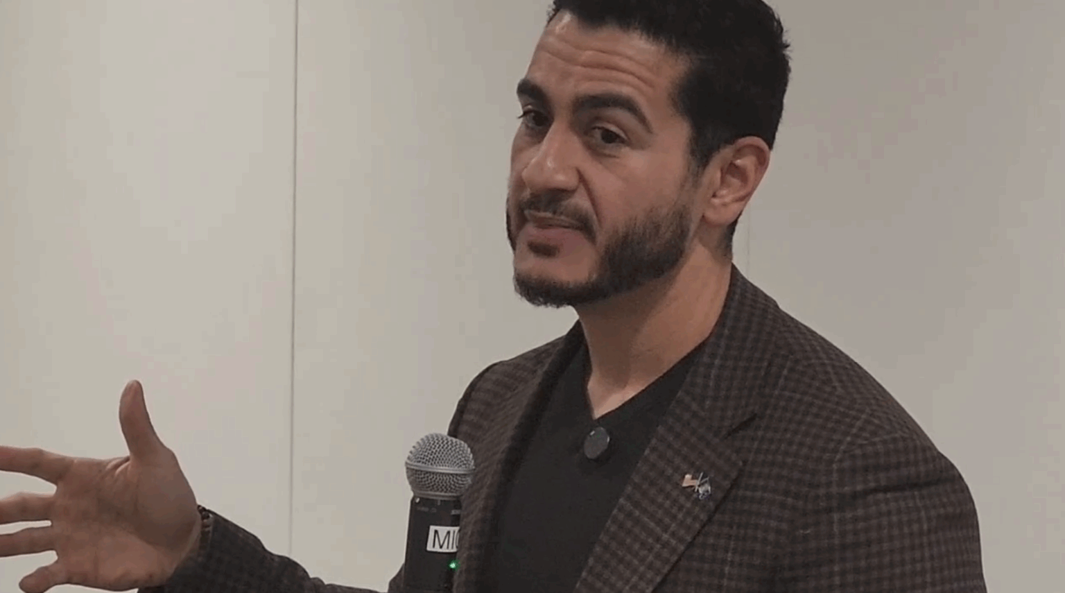Abdul El-Sayed speaking at a town hall event in Iron Mountain, Michigan