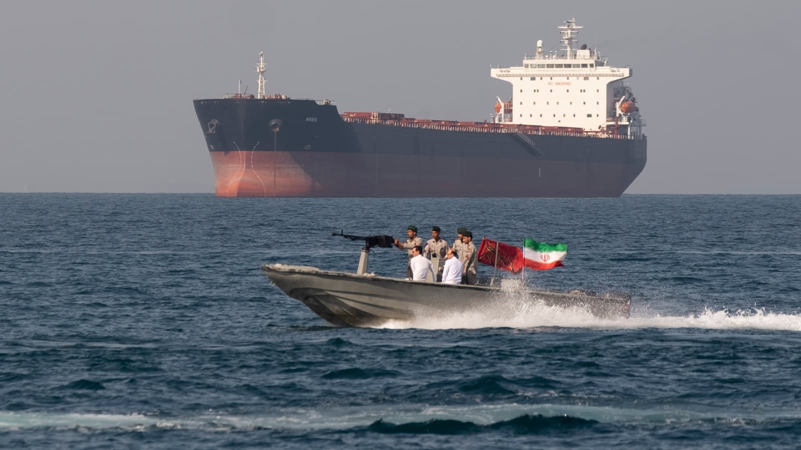 An oil tanker transits a busy shipping lane associated with global energy trade