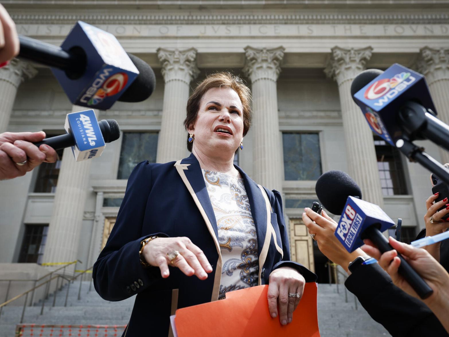 Attorney Norman Eisen, who represented David Hearn, speaks to reporters