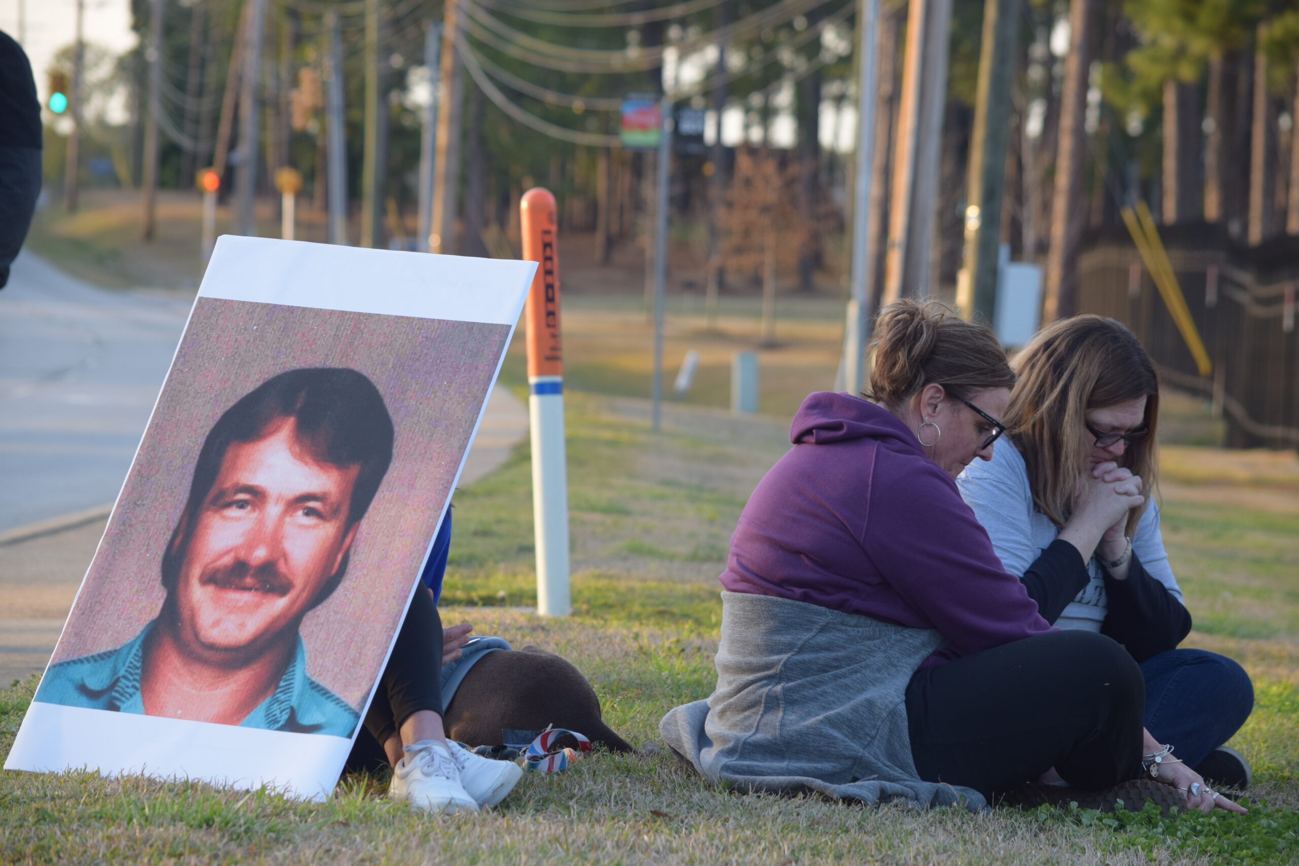 Brad Sigmon seated at a table in a South Carolina courtroom during a court proceeding, news photography style