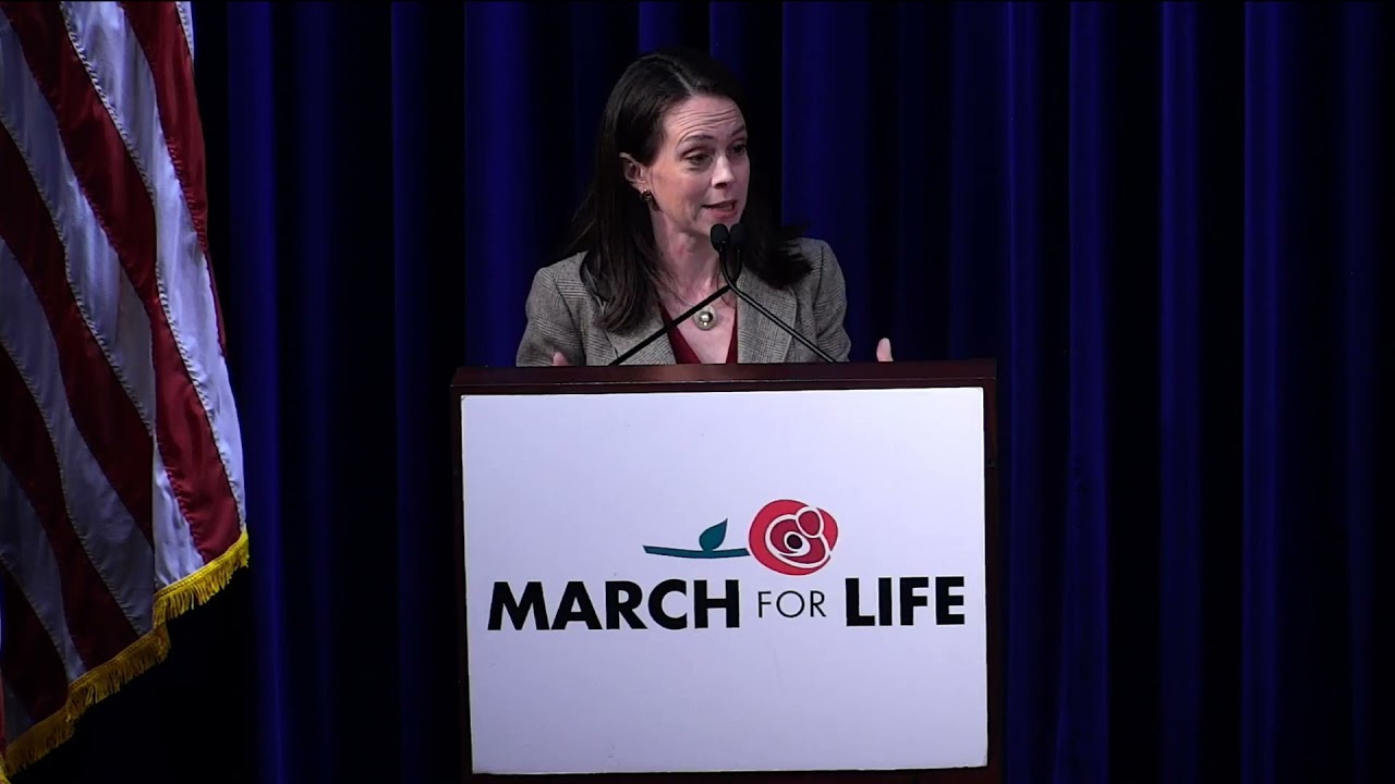 Carrie Severino speaking during a public appearance