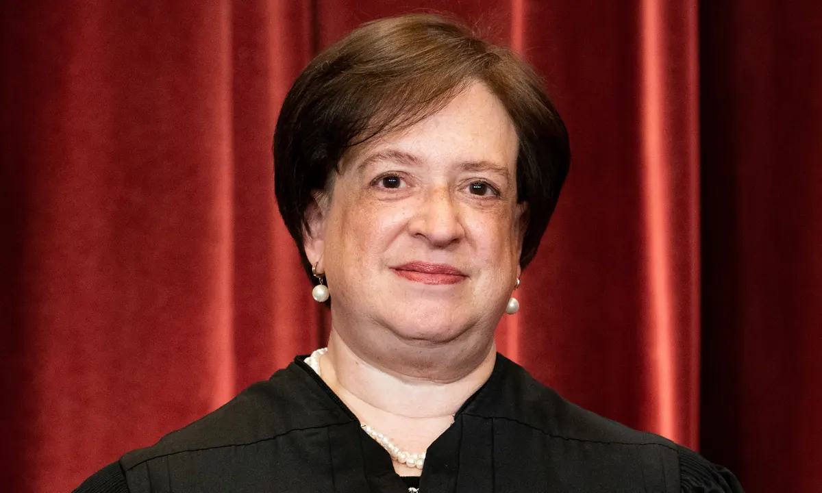 Elena Kagan seated on the Supreme Court bench during a session in Washington, DC, news photography style