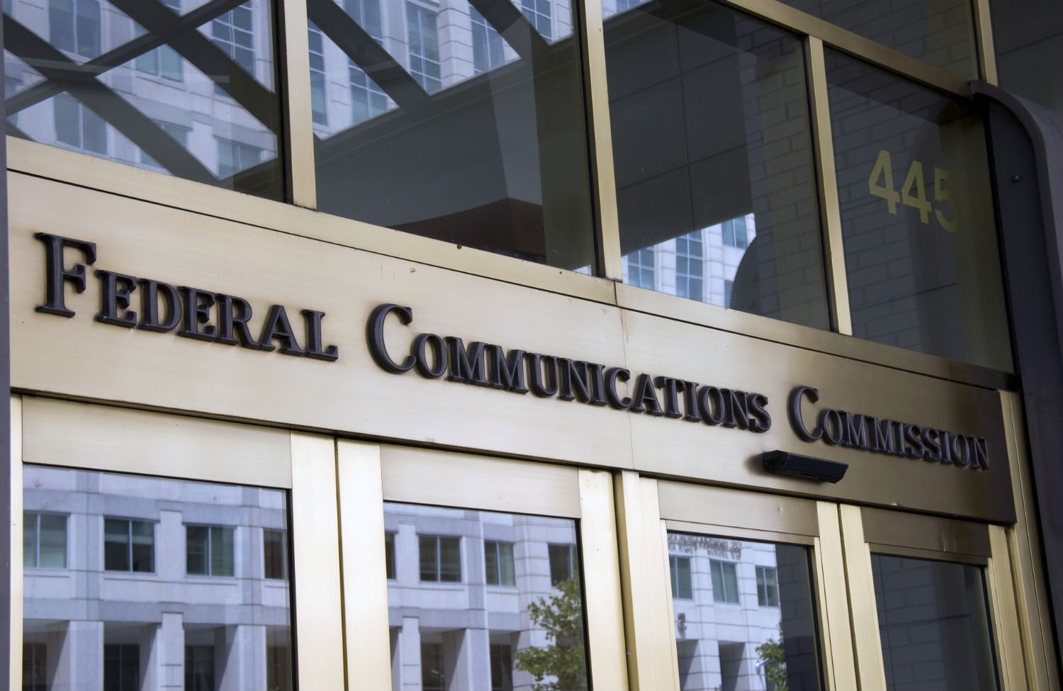 Federal Communications Commission chief Brendan Carr speaking at a public event.