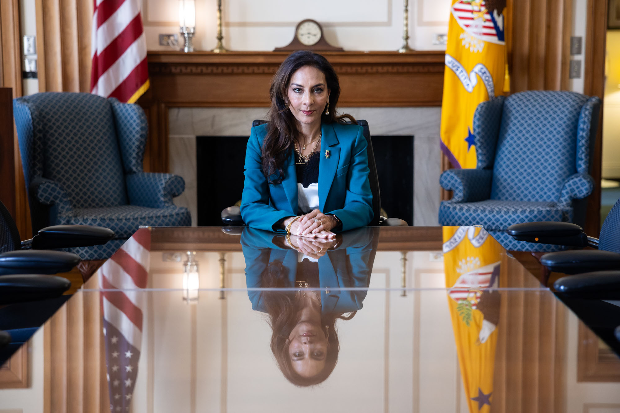 Harmeet Dhillon speaking at a Justice Department podium in Washington, DC, during a media availability about Second Amendment litigation, news photography style