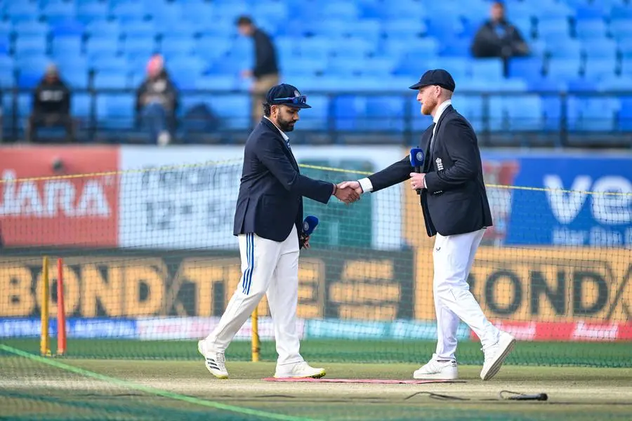 India and England captains at a pre-match toss during an international cricket game