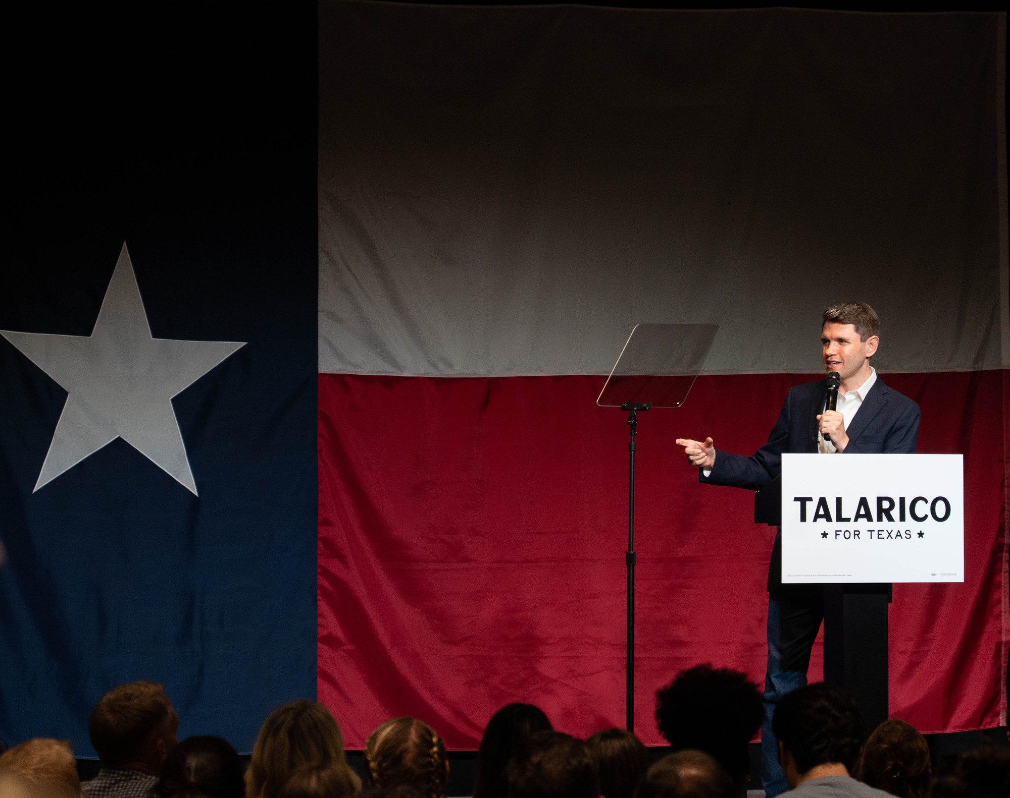 James Talarico speaking at a campaign event in Texas, addressing supporters from a stage or podium