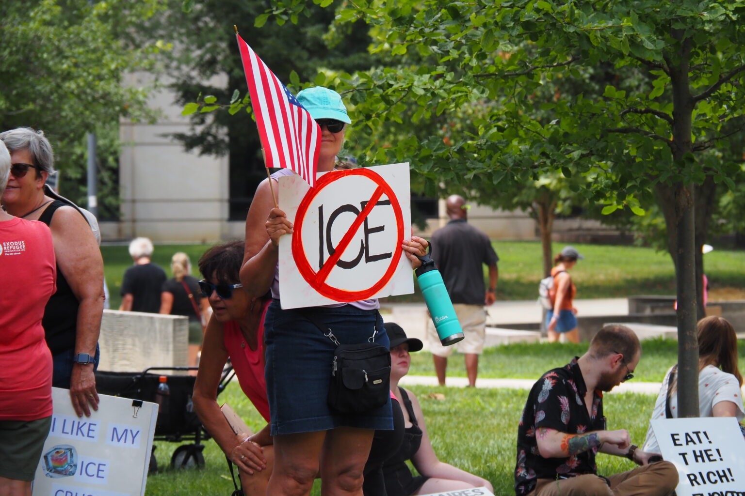 Kassandra Rosado speaking to reporters outdoors in Chicago in 2026, candid news photography style