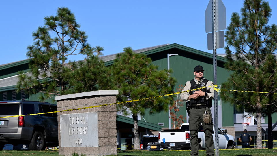 Law enforcement vehicles positioned near Silver Rail Elementary School during a response and lockdown in Bend, Oregon