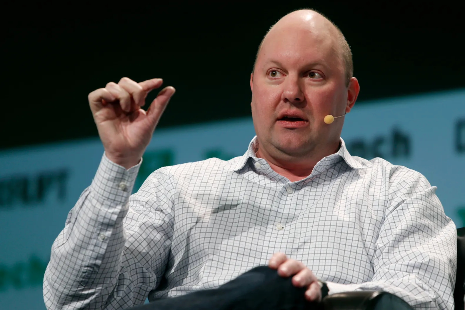 Marc Andreessen at a public event, photographed in a candid news style setting with a neutral background