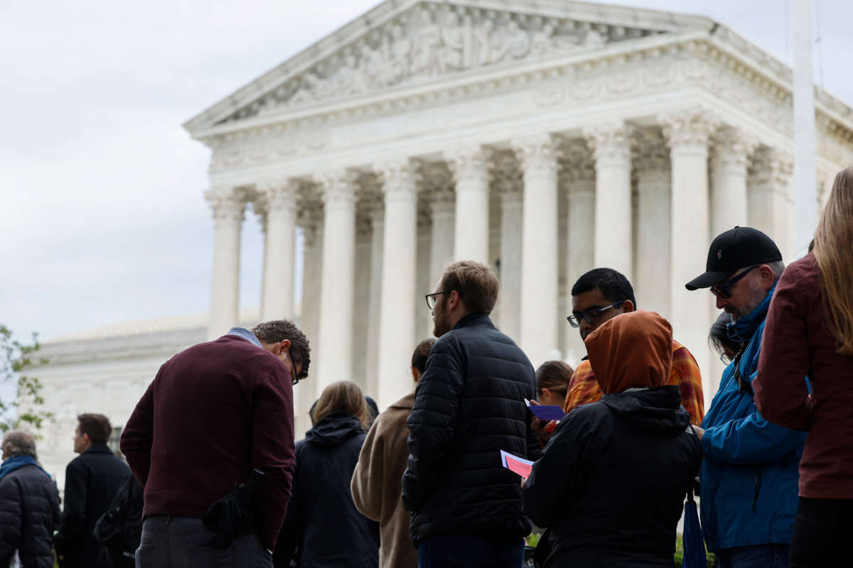 Members of the public outside the U.S. Supreme Court, a common scene on oral-argument days in Washington, D.C.