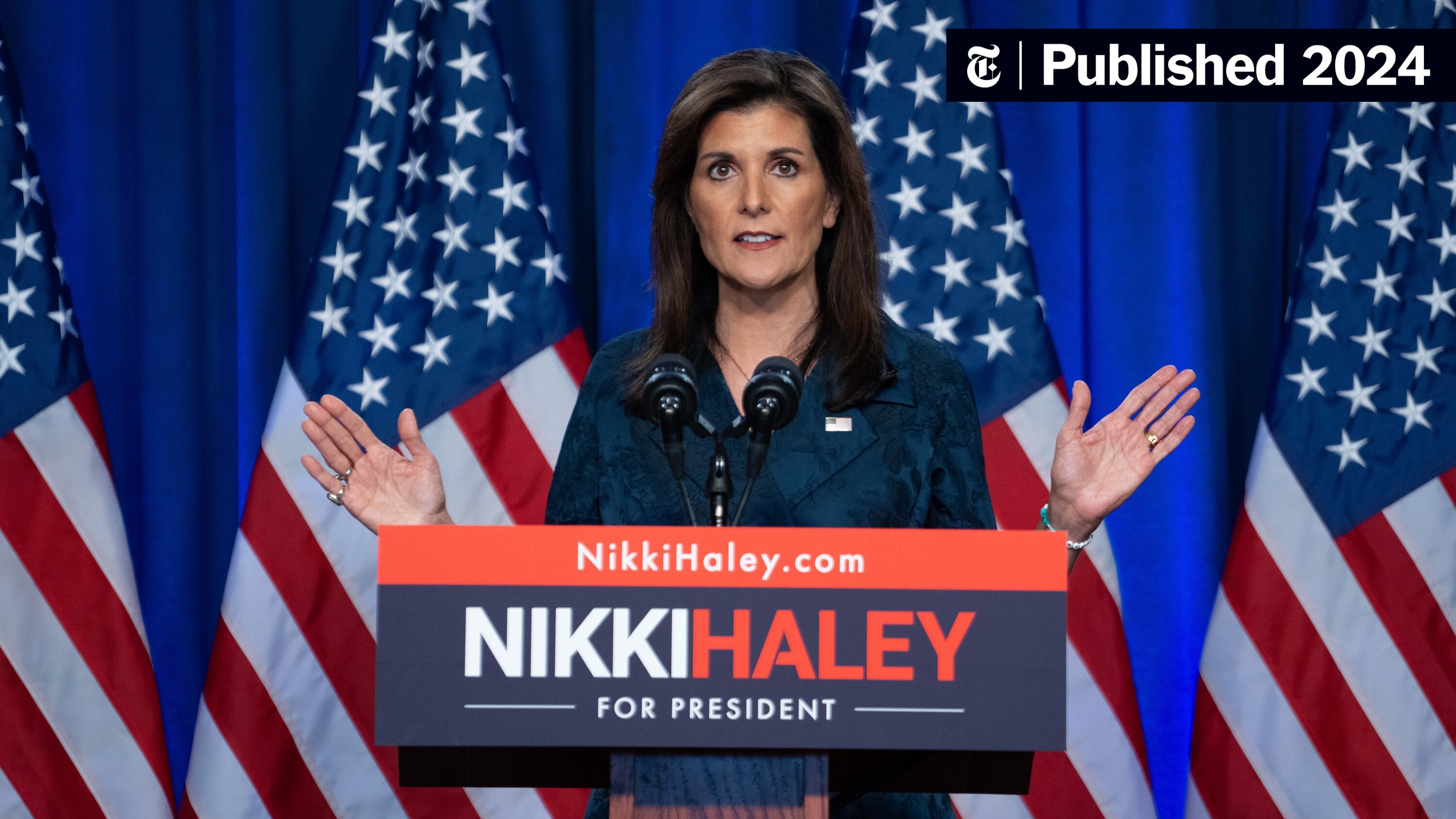 Nikki Haley speaking at a public event in South Carolina with an audience seated behind her, news photography style