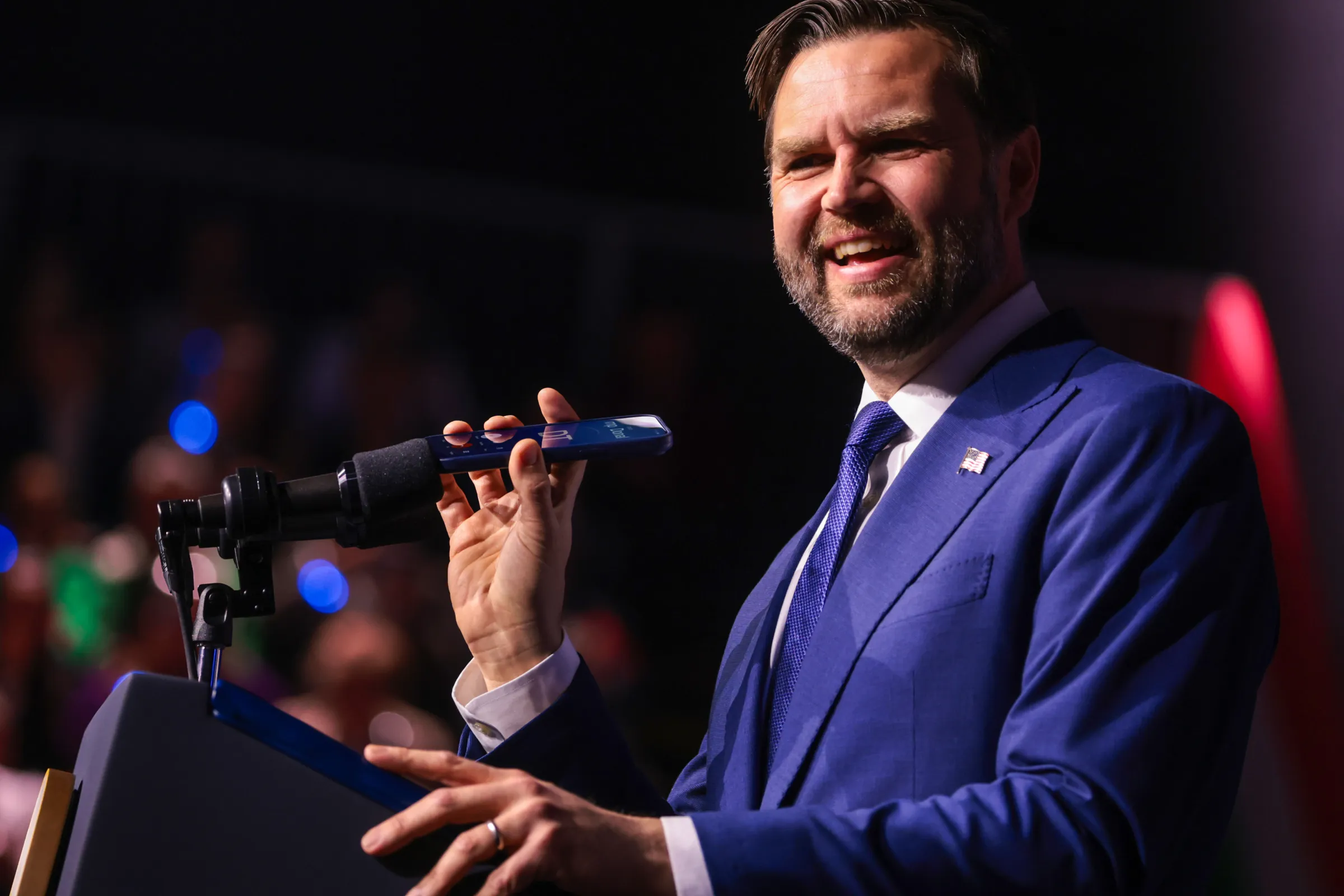 Okello Chatrie walking with his attorney outside a federal courthouse, news photography style
