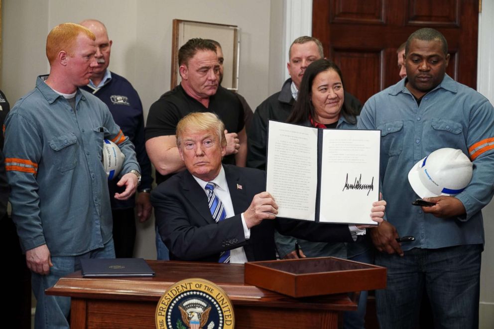President Donald Trump at a public event in 2018 associated with the administration’s Section 232 steel and aluminum tariff action, which was implemented through presidential proclamations