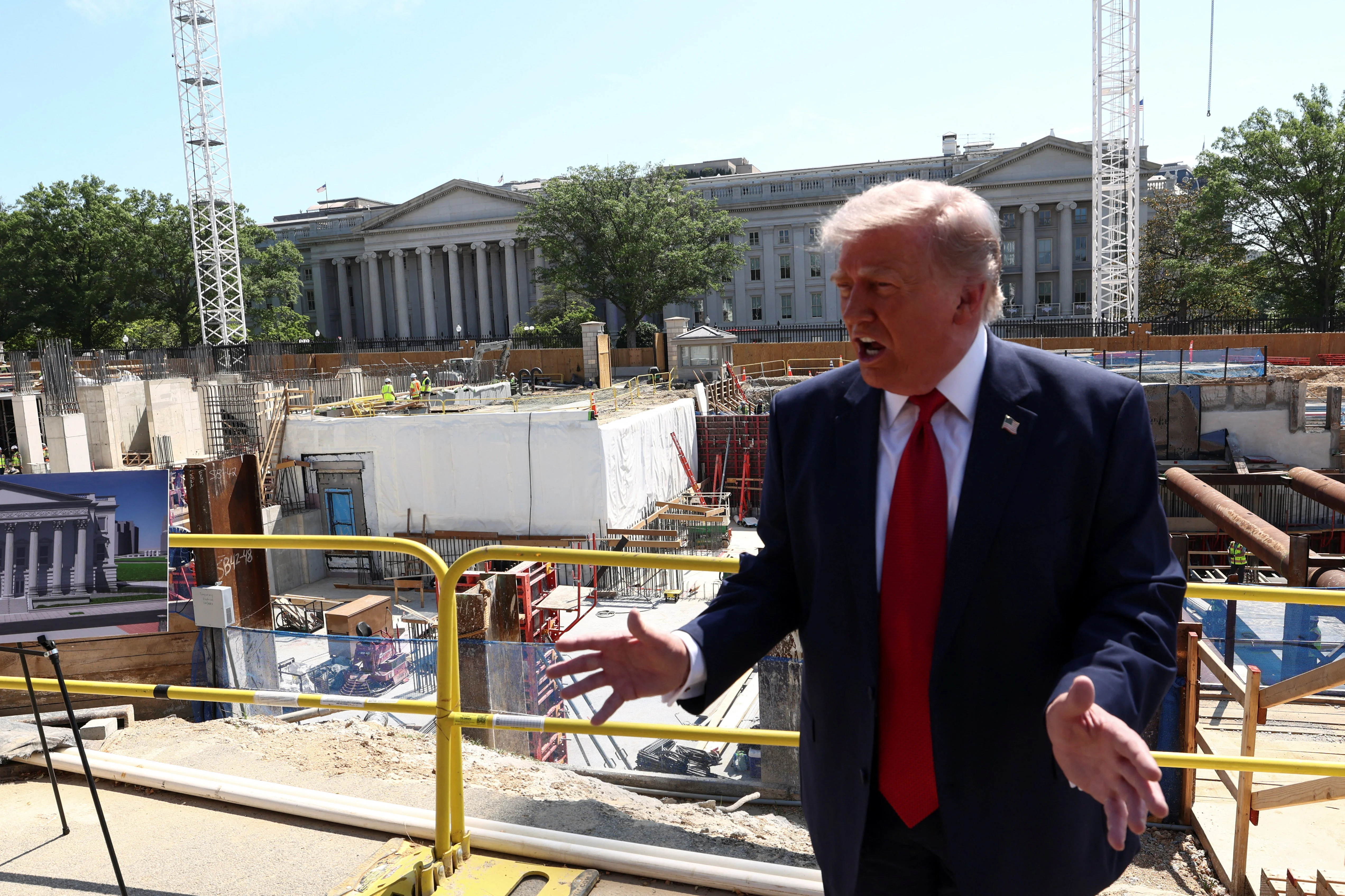 President Donald Trump speaking to reporters outdoors at the White House, candid news photography style