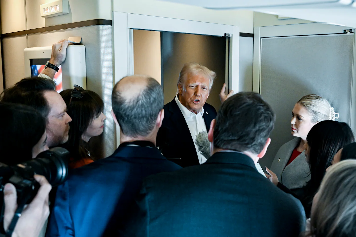 President Donald Trump speaks with reporters as he arrives on Air Force One at Joint Base Andrews in Maryland on October 10, 2026.
