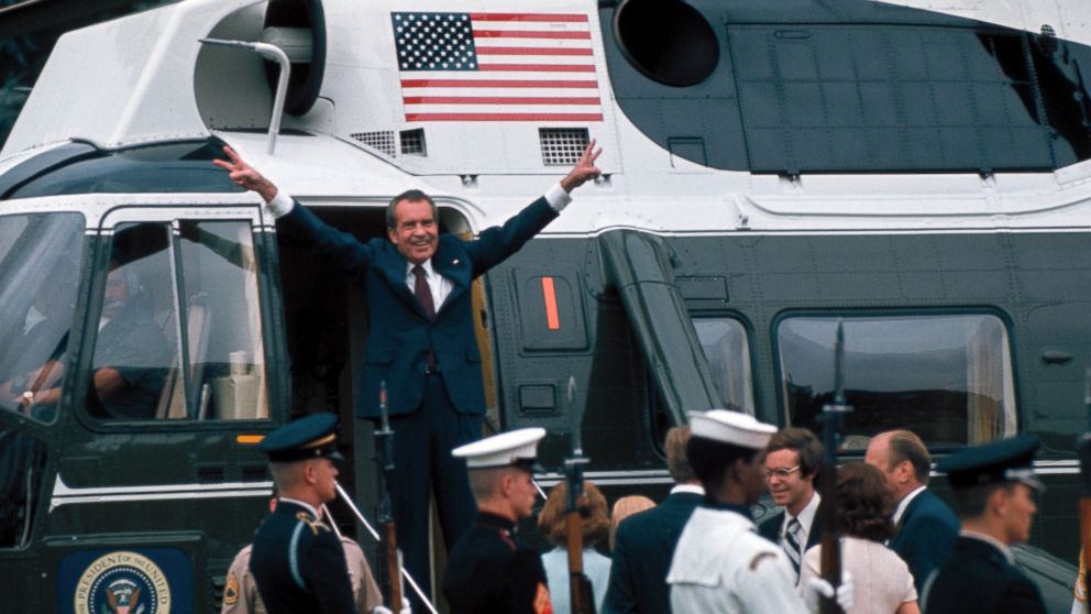President Richard Nixon at the White House in 1974, photographed in a formal setting during the Watergate era, news photography style