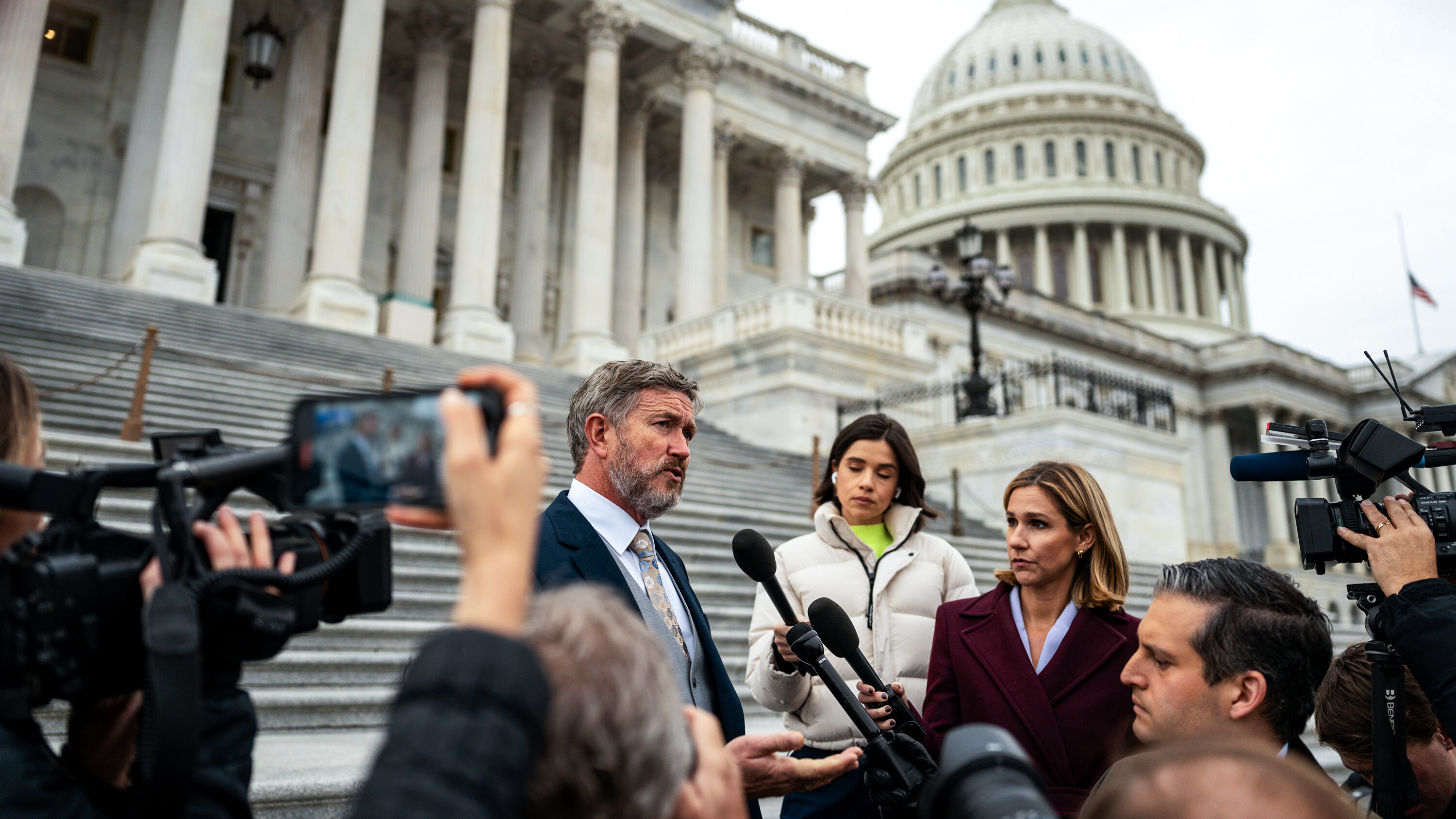 Rep. Thomas Massie speaks to reporters outside the U.S. Capitol.