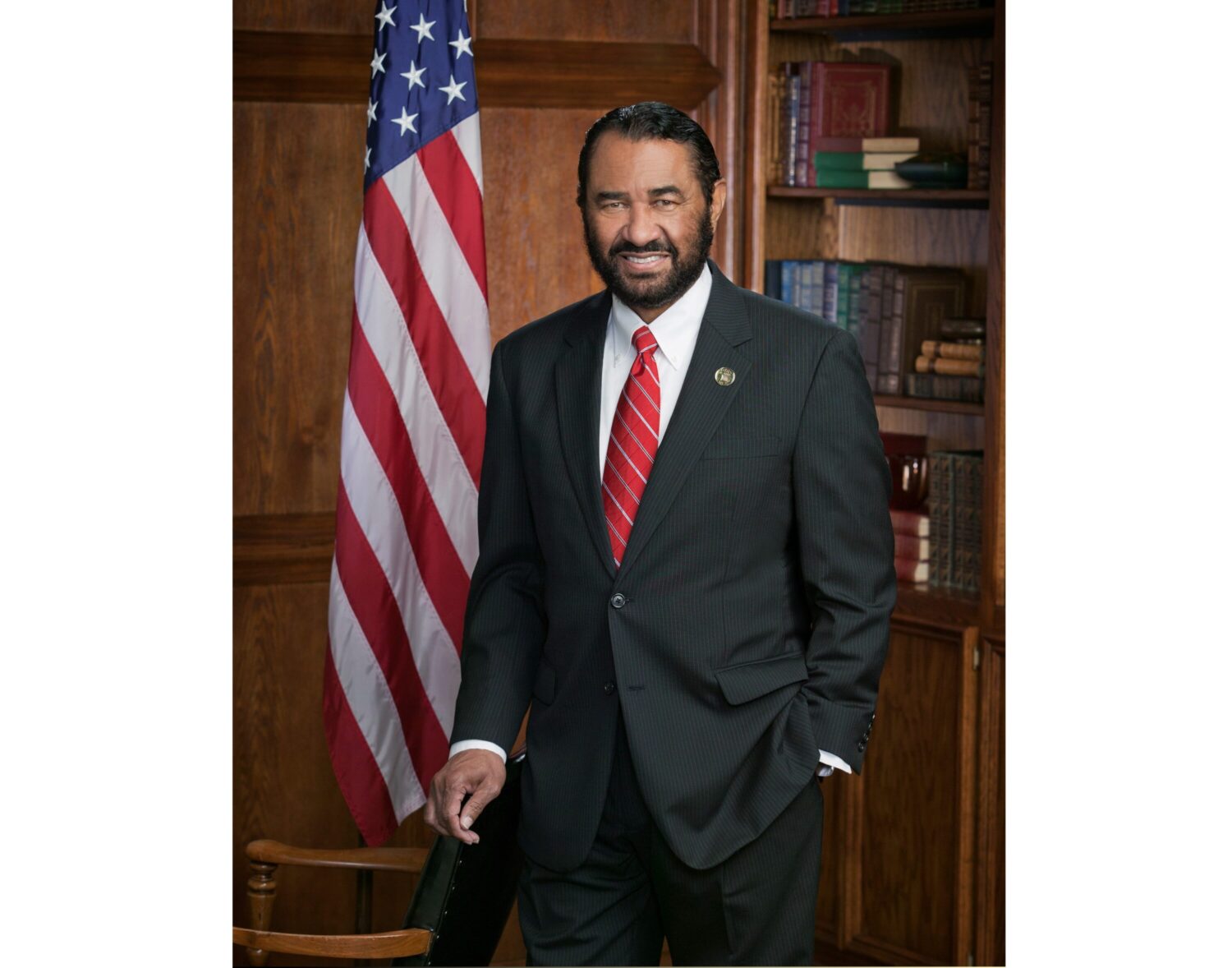 Representative Al Green of Texas speaking at a lectern during a public event
