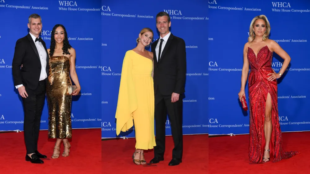 Secret Service agents moving quickly inside a hotel ballroom during a formal dinner event, guests in evening attire looking toward a security response, news photography style