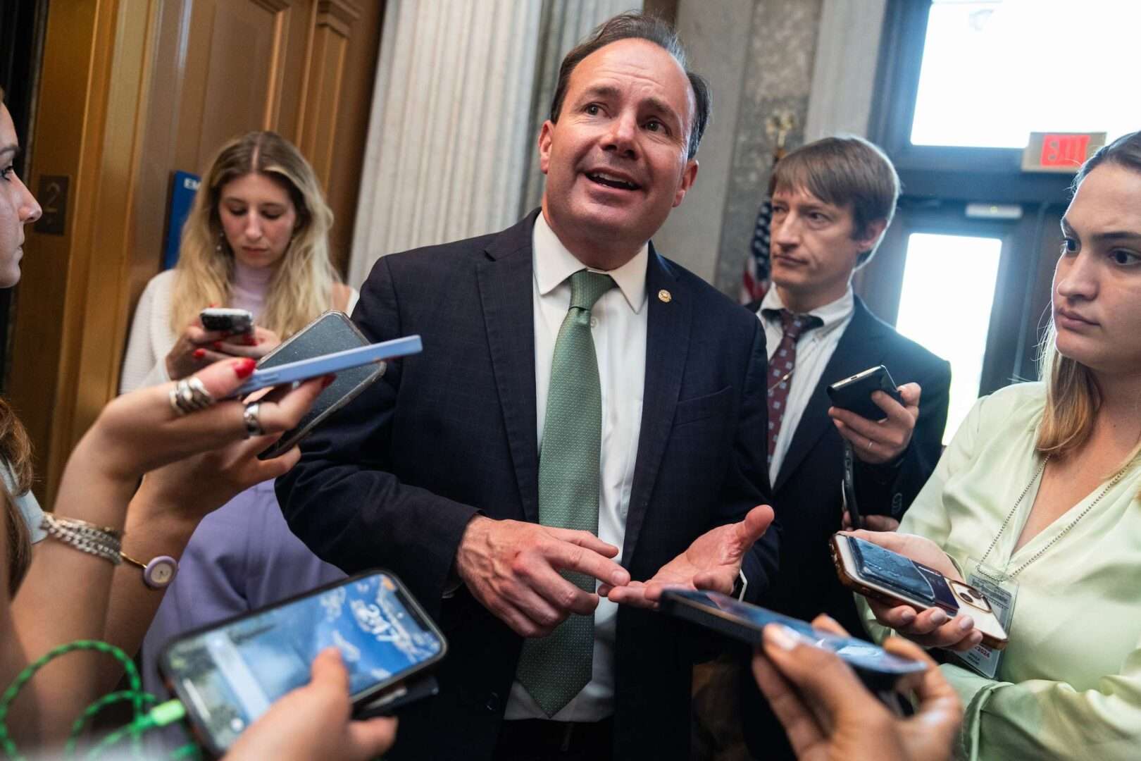 Sen. Mike Lee speaking to reporters outside the U.S. Capitol