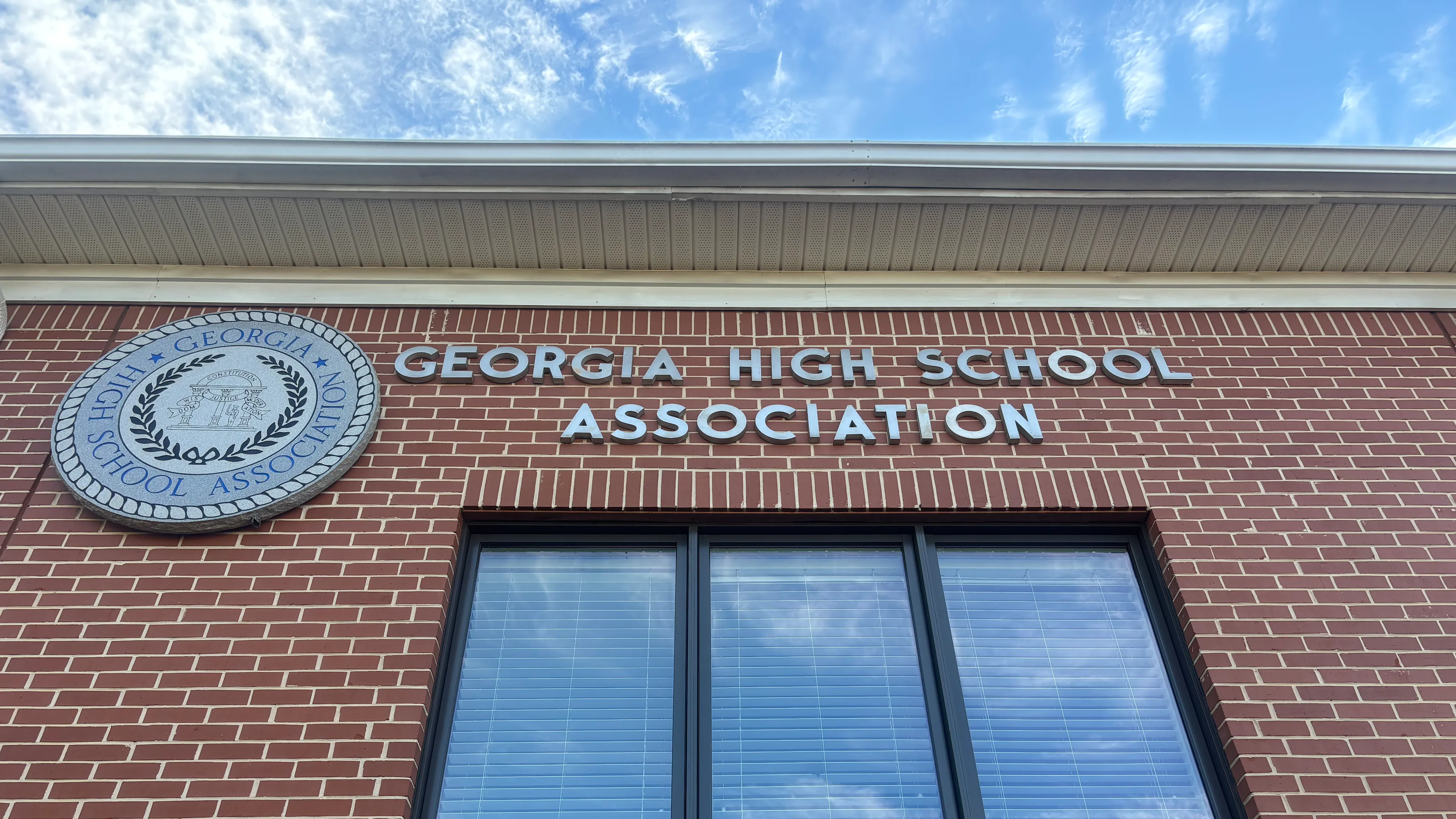The Georgia High School Association building, reflecting how statewide athletic eligibility rules can affect local school teams