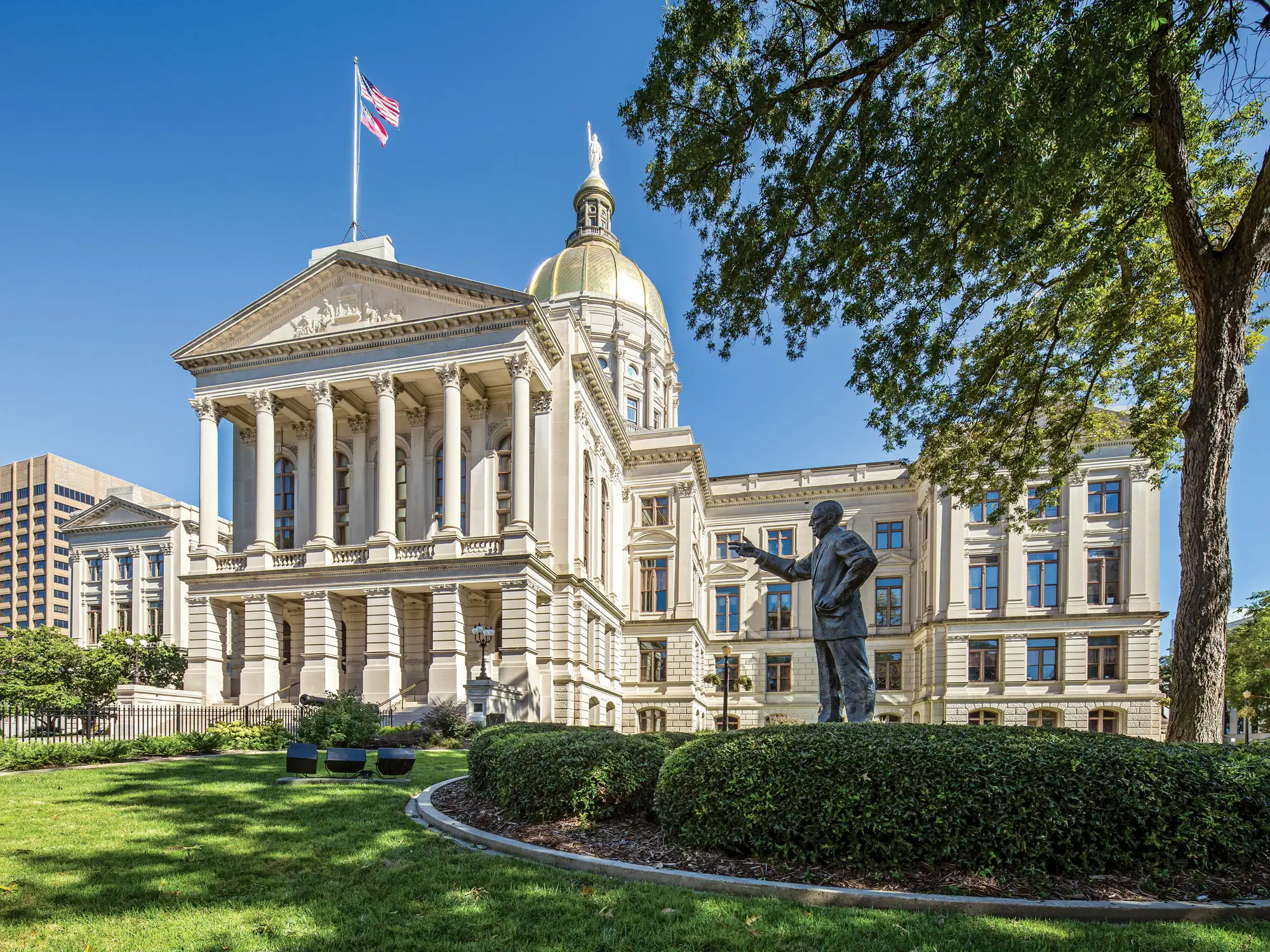 The Georgia State Capitol building in Atlanta photographed from the grounds, with the gold dome visible in daylight