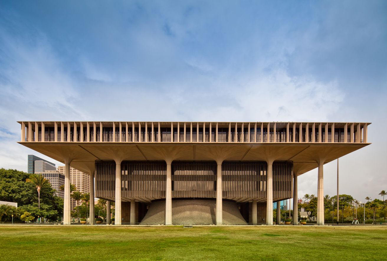 The Hawaii State Capitol in Honolulu, Hawaii, viewed from outside near the reflecting pool
