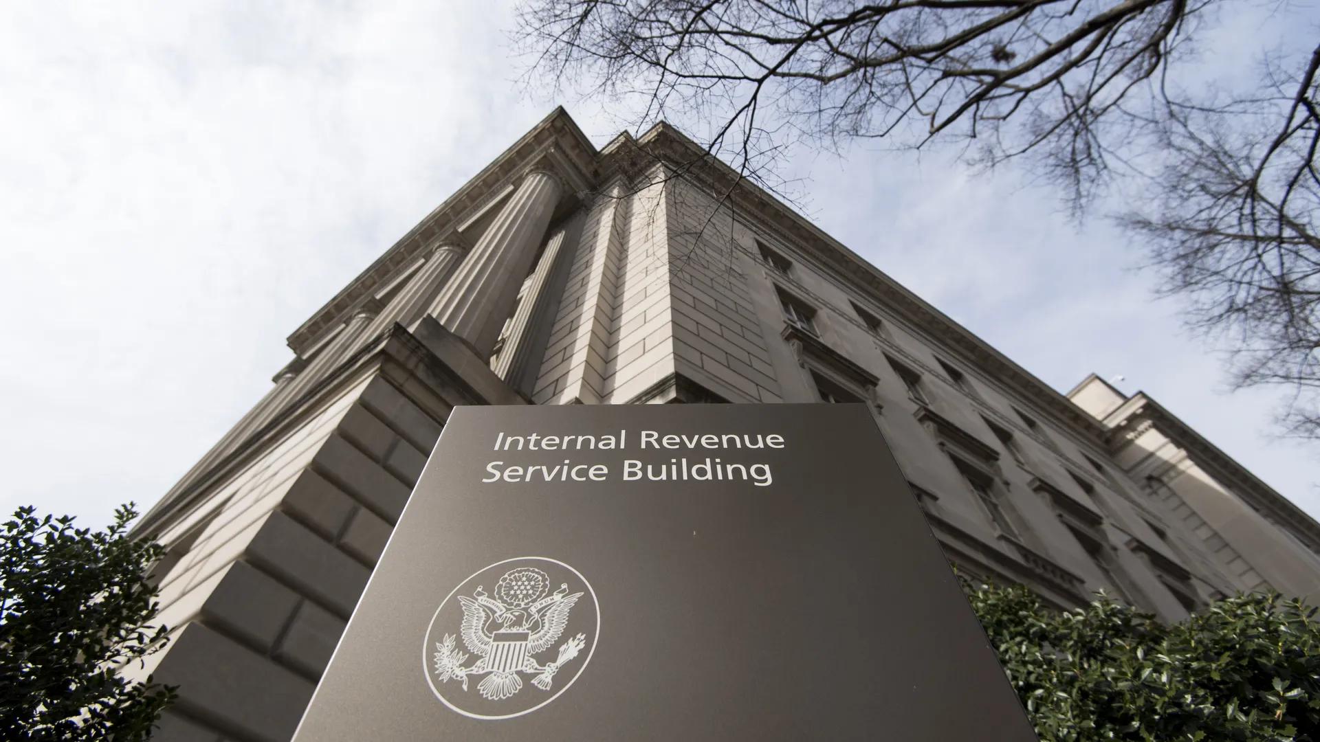The IRS headquarters building in Washington, D.C., photographed from street level with the facade and entrance visible