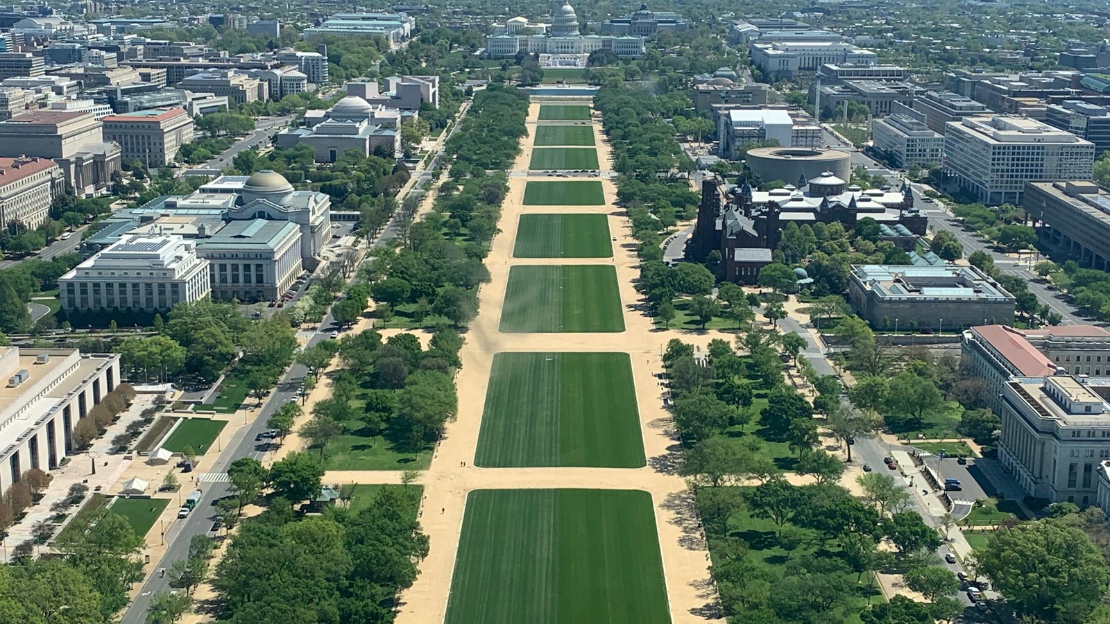 The Lincoln Memorial Reflecting Pool on the National Mall in Washington, DC, with the Lincoln Memorial visible in the distance, photographed in daylight