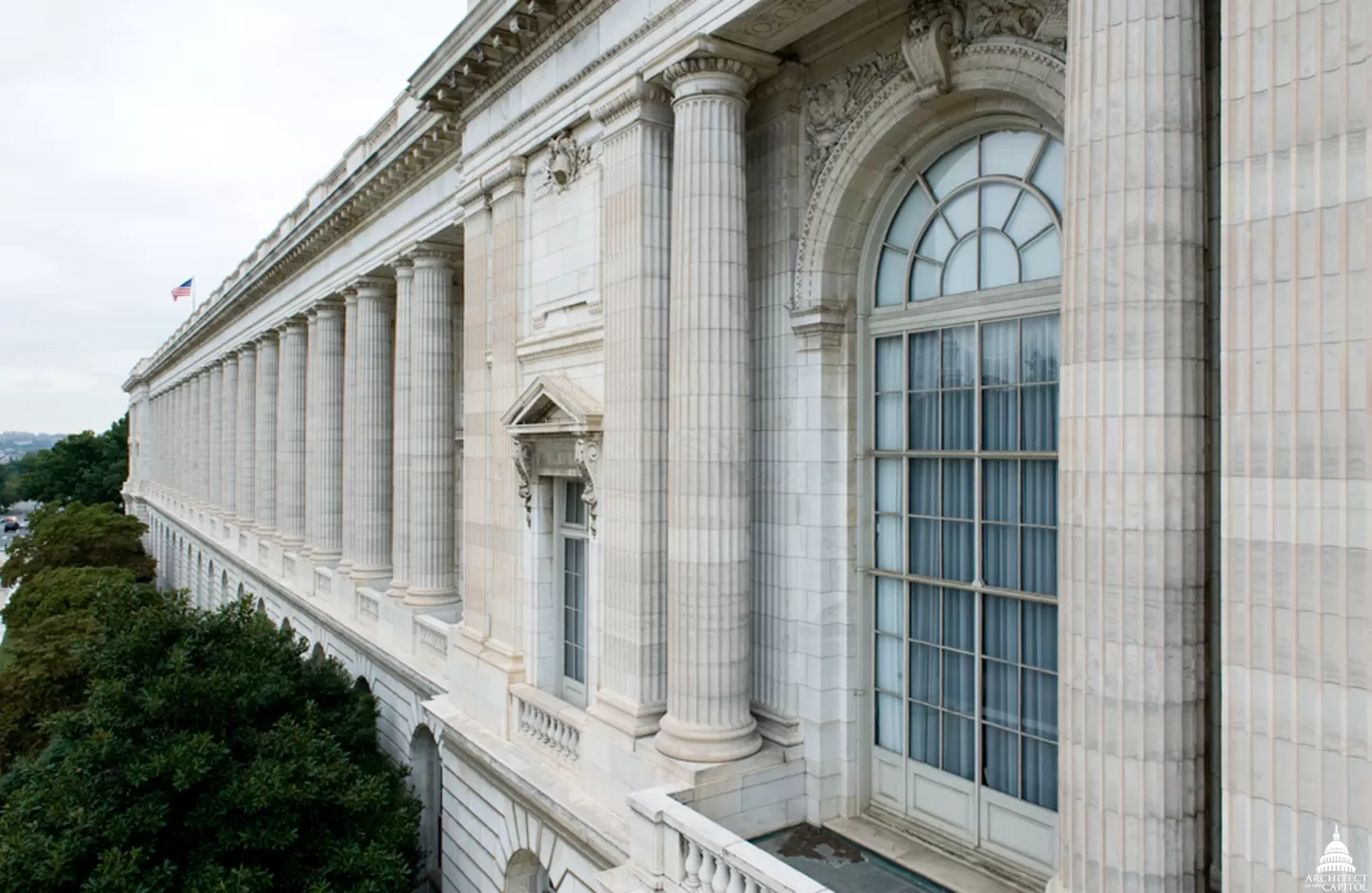 The National Archives Rotunda in Washington, DC with the U.S. Constitution displayed in its encasement, viewed from the public gallery area
