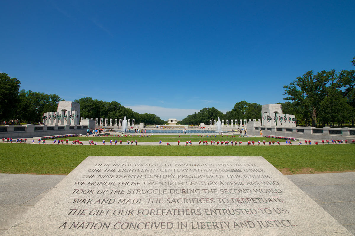 The National World War II Memorial in Washington, DC, on the National Mall, showing stone pillars and the central fountain