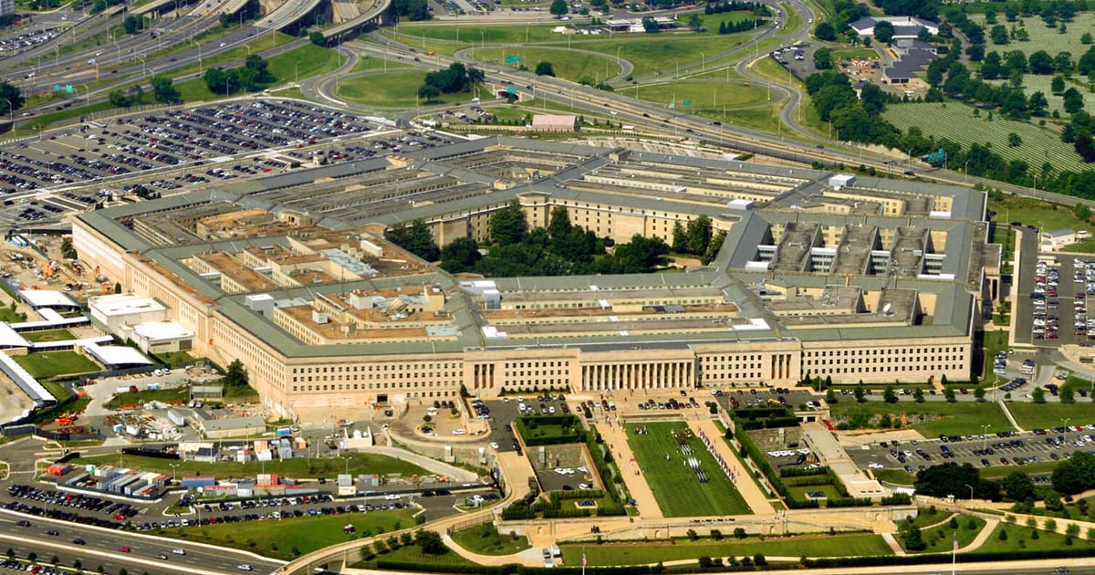 The Pentagon photographed from outside, showing the building exterior and surrounding roadways in daylight